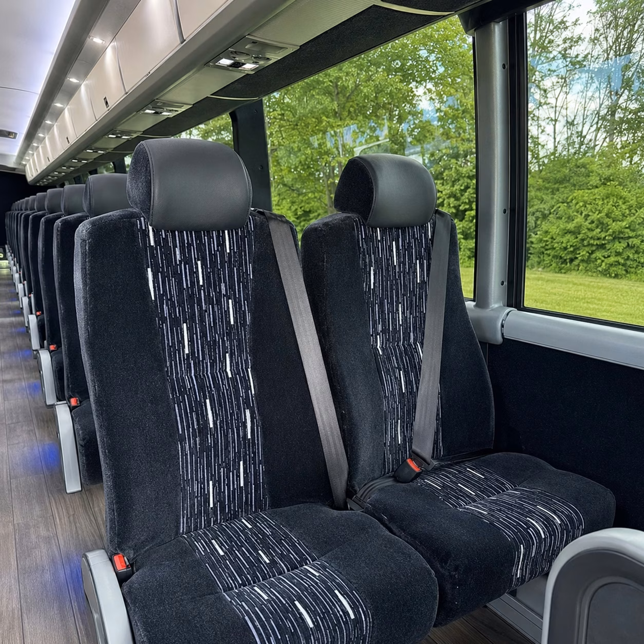 how time of year and peak season affect springdale charter bus rental prices